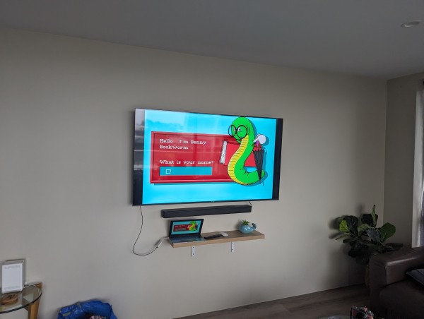 TV screen in hotel with word rescue dos game being displayed.