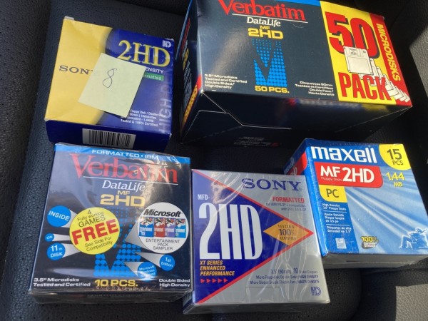 Several boxes of blank floppies. One boxes comes with a Microsoft Entertainment Pack sampler of four games. 