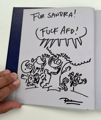 Eine Zeichnung, auf der sehr viele Ruthe-Figuren gemeinsam fröhlich„Fuck AfD“ rufen.