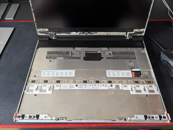 framework laptop 16 with the keyboard and trackpad modules removed, the midplate is fully visible