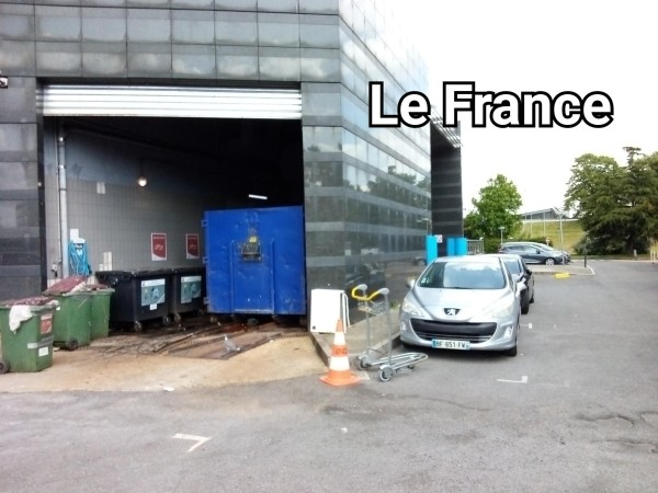 Pictures of dumpsters labeled "Le France"