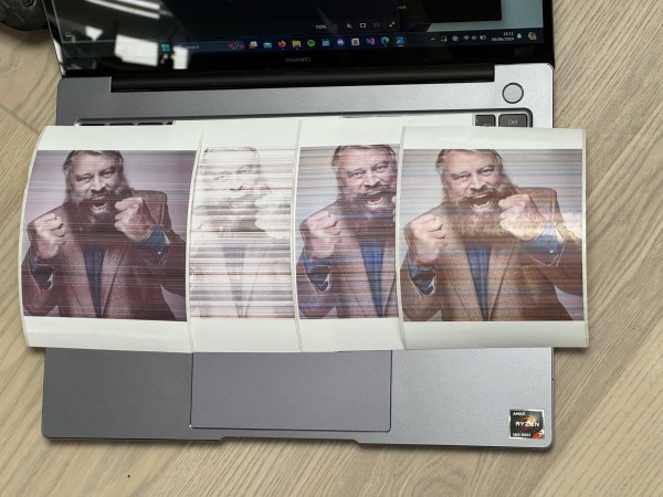 4 prints of Brian Blessed. Left one is dark and streaky, the 2nd one is mostly white with the odd steak of Brian, the 3rd is getting better and the 4th is colourful but still streaky. 