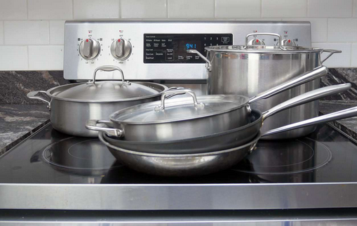 stovetop with control knobs above the heat plates