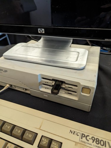 Vintage PC with floppy drive internally converted to USB while retaining the outer form factor of a floppy drive