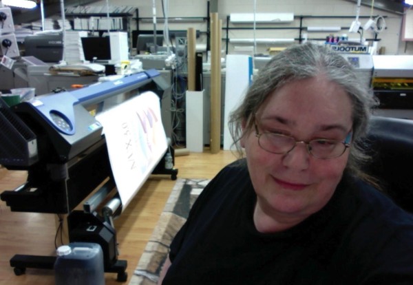 A photo of a tired but pretty happy all up nanoraptor around printy stuff.