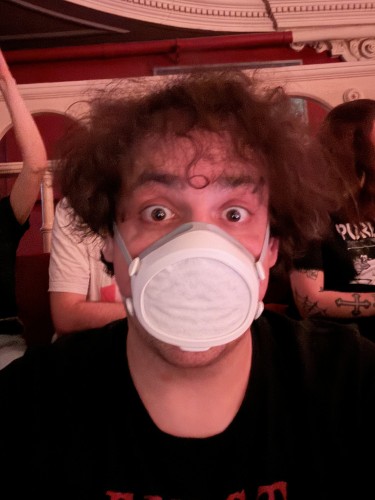 Selfie wearing a mask in a theatre. 