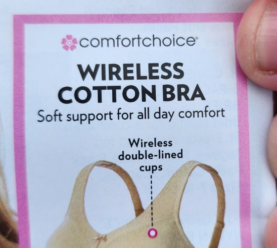 An ad for a comfortchoice® WIRELESS COTTON BRA. It says it's got "Soft support for all day comfort", and "Wireless double-lined cups". The top of the bra is visible at the bottom of the image. 